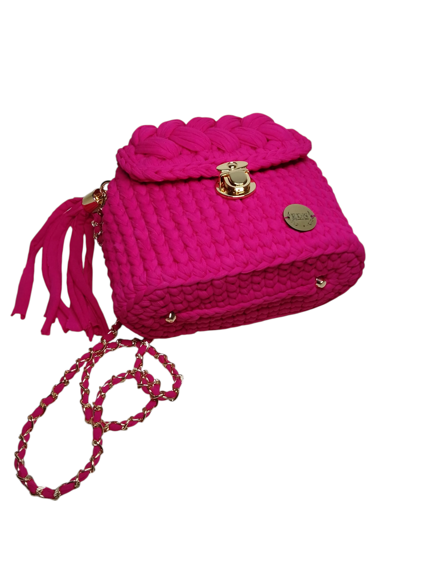 Bolso en trapillo pluma color fucsia. Bolso ligero tejido a mano.