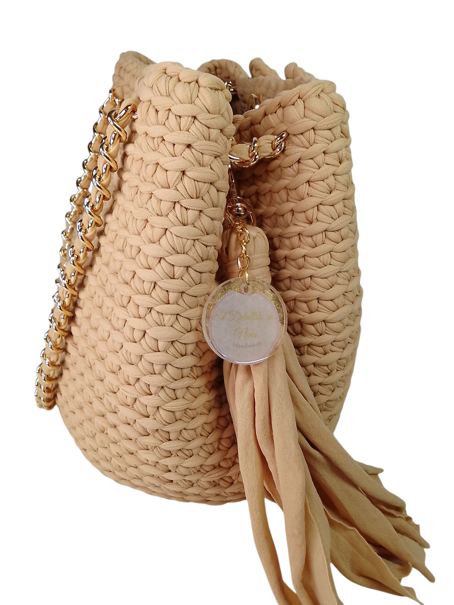 Bolso cubo beige.