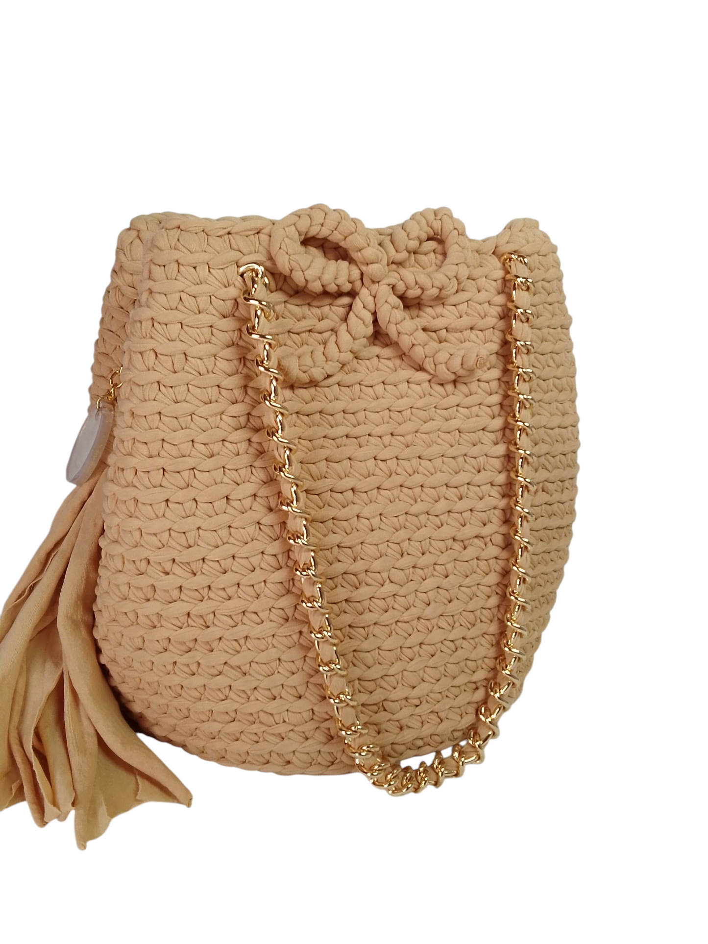 Bolso cubo beige.
