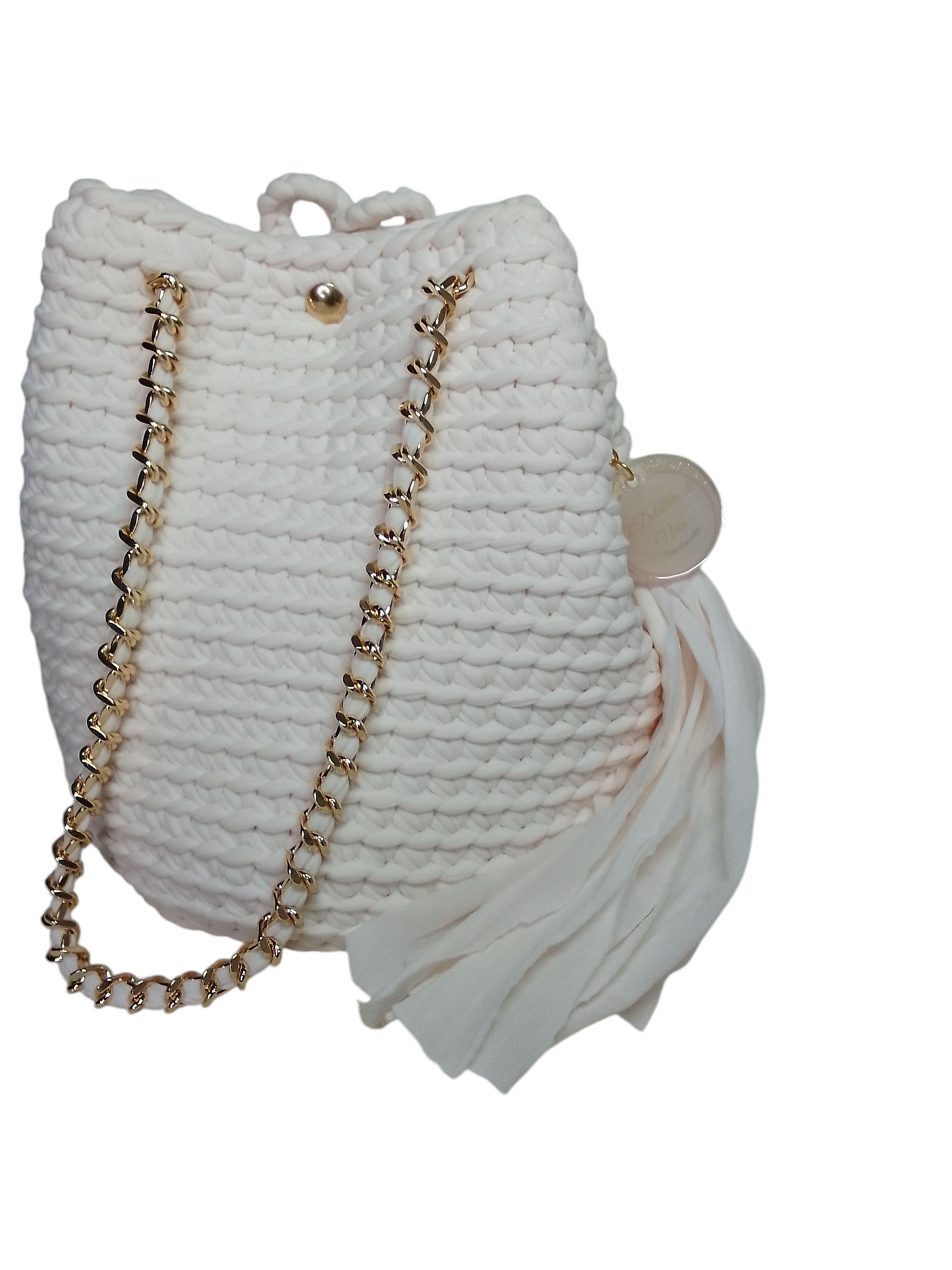 Bolso cubo color crudo (tono rosado suave). Bolso mochila saco crudo. Bolso atemporal
