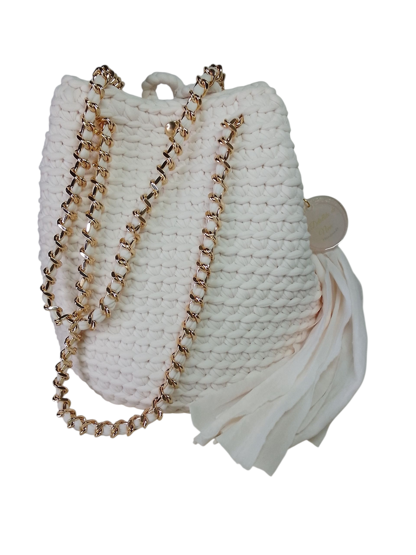 Bolso cubo color crudo (tono rosado suave). Bolso mochila saco crudo. Bolso atemporal