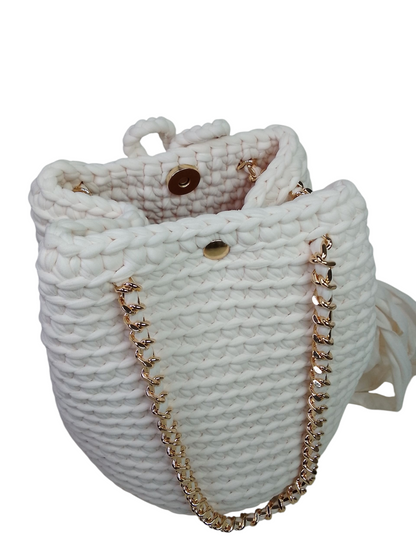 Bolso cubo color crudo (tono rosado suave). Bolso mochila saco crudo. Bolso atemporal