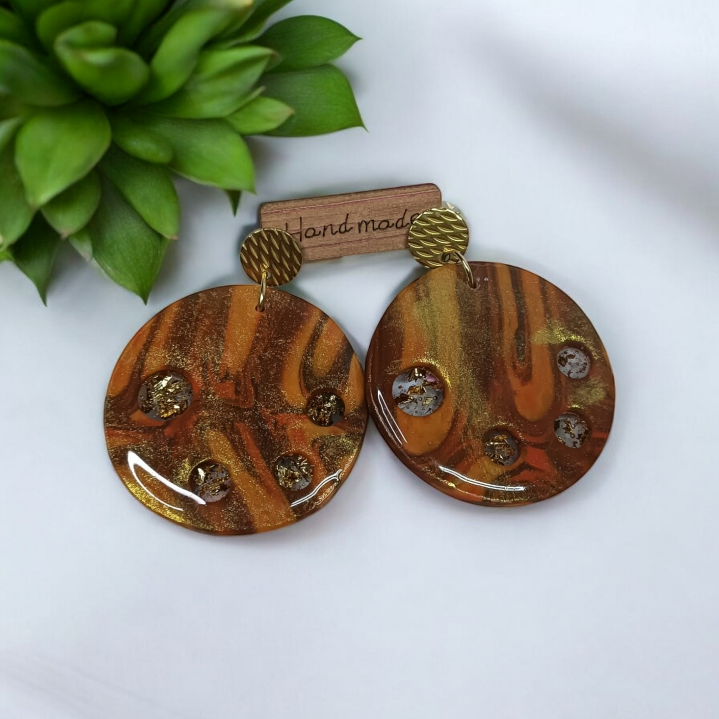 Pendientes marrón dorado